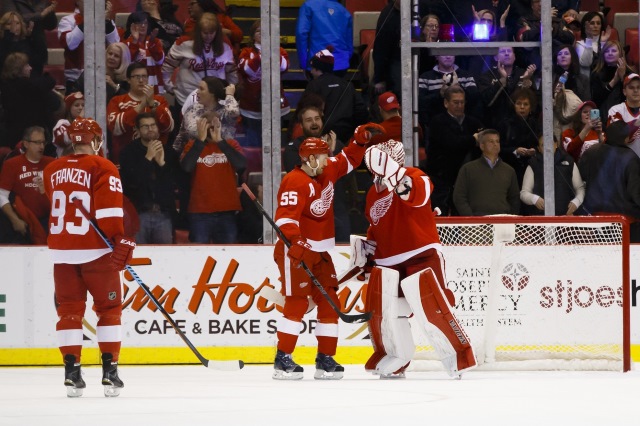 Johan Franzen and Jimmy Howard of the Detroit Red Wings