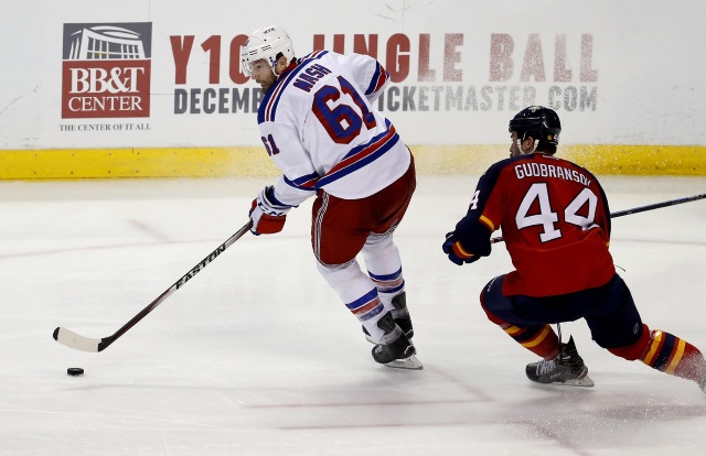 Rick Nash of the New York Rangers and Erik Gudbranson of the Florida Panthers