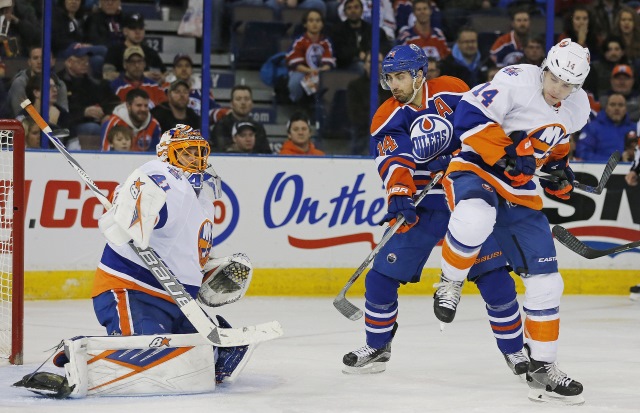 Jaroslav Halak of the New York Islanders and Jordan Eberle of the Edmonton Oilers