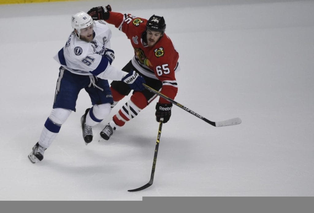 Steve Stamkos of the Tampa Bay Lighting and Andrew Shaw of the Chicago Blackhawks