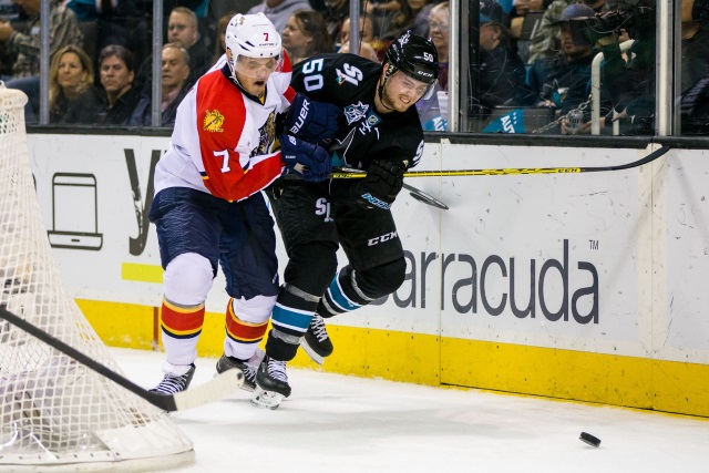 Dmitry Kulikov of the Florida Panthers and Chris Tierney of the San Jose Sharks