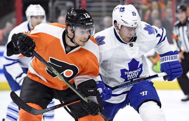 Joffrey Lupul of the Toronto Maple Leafs and Michael Raffl of the Philadelphia Flyers