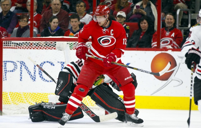Eric Staal of the Carolina Hurricanes and Corey Crawford of the Chicago Blackhawks