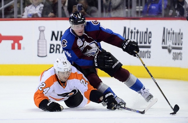 Tyson Barrie of the Colorado Avalanche and Matt Read of the Philadelphia Flyers