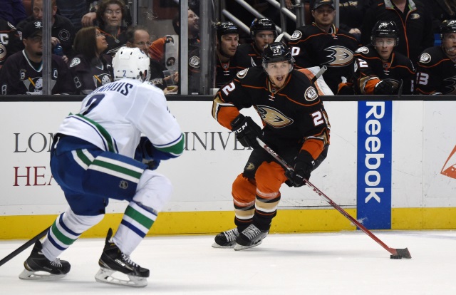 Dan Hamhuis of the Vancouver Canucks and Shawn Horcoff of the Anaheim Ducks
