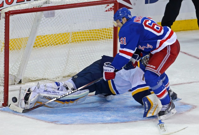 Rick Nash of the New York Rangers and Brian Elliott of the St. Louis Blues