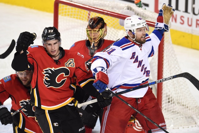 Sean Monahan of the Calgary Flames and Rick Nash of the New York Rangers