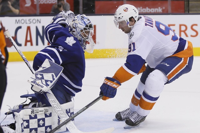 John Tavares of the New York Islanders and Garret Sparks of the Toronto Maple Leafs
