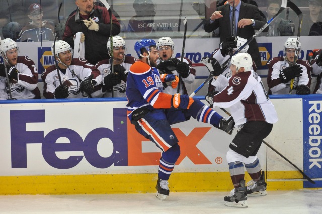 Tyson Barrie of the Colorado Avalanche and Patrick Maroon of the Edmonton Oilers