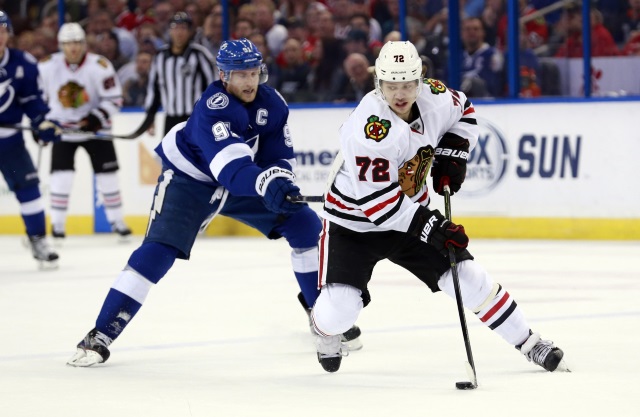 Artemi Panarin of the Chicago Blackhawks and Steven Stamkos of the Tampa Bay Lightning