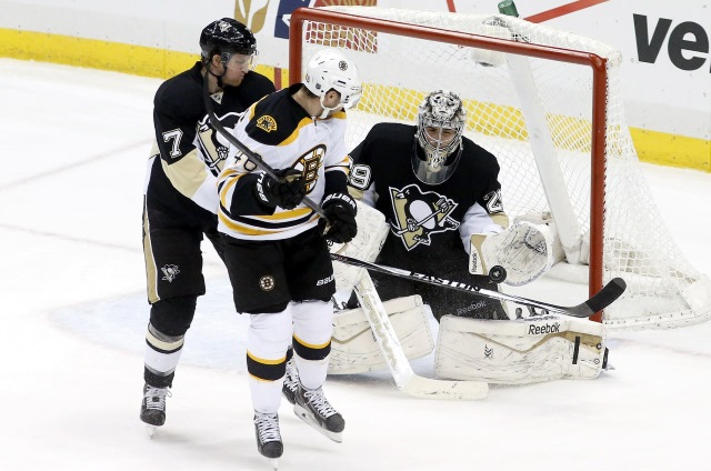 Marc-Andre Fleury of the Pittsburgh Penguins and David Krejci of the Boston Bruins