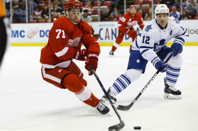 Stephane Robidas of the Toronto Maple Leafs and Dylan Larkin Detroit Red Wings