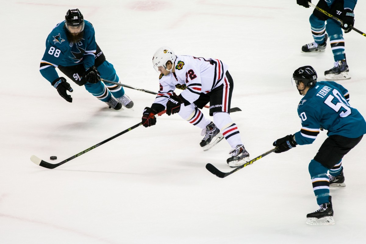 Brent Burns of the San Jose Sharks and Artemi Panarin of the Chicago Blackhawks