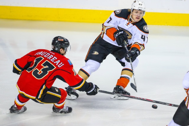 Hampus Lindholm of the Anaheim Ducks and Johnny Gaudreau of the Calgary Flames