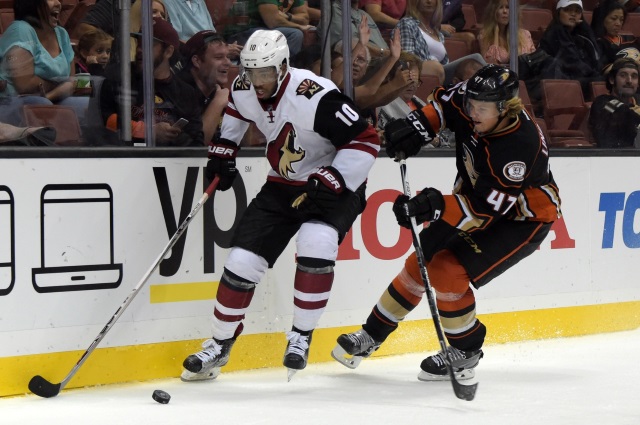 Hampus Lindholm of the Anaheim Ducks and Anthony Duclair of the Arizona Coyotes