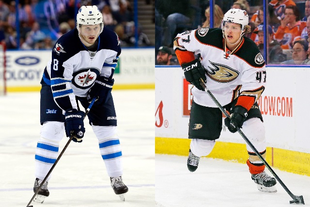 Jacob Trouba of the Winnipeg Jets and Hampus Lindholm of the Anaheim Ducks