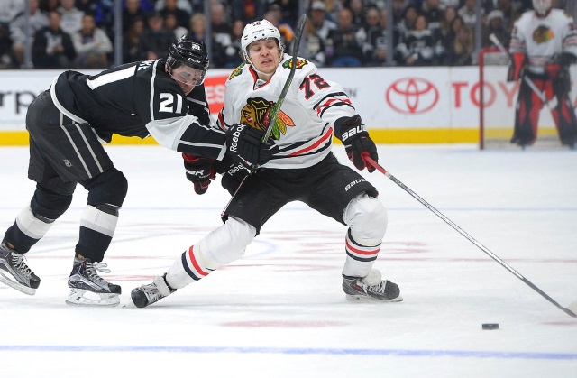 Artemi Panarin of the Chicago Blackhawks and Nick Shore of the Los Angeles Kings
