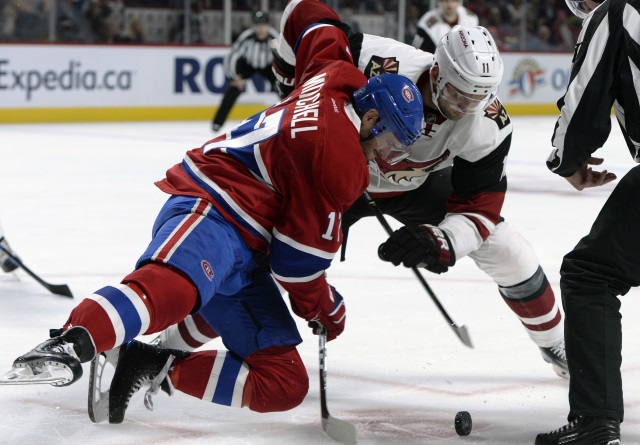 Martin Hanzal of the Arizona Coyotes and Torrey Mitchell of the Montreal Canadiens