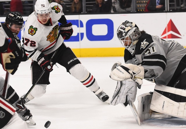 Artemi Panarin of the Chicaog Blackhawks and Peter Budaj of the Los Angeles Kings