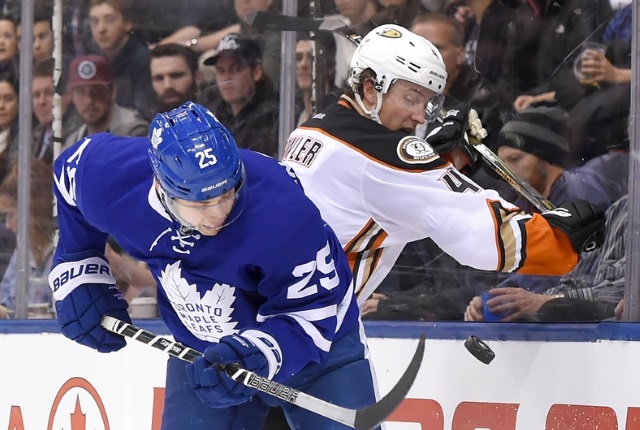 James van Riemsdyk of the Toronto Maple Leafs and Cam Fowler of the Anaheim Ducks