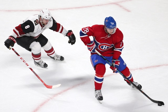 Nathan Beaulieu of the Montreal Canadiens and Tobias Rieder of the Arizona Coyotes