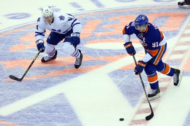 John Tavares of the New York Islanders and Morgan Rielly of the Toronto Maple Leafs