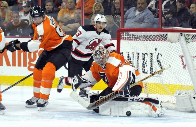 Mike Cammalleri of the New Jersey Devils and Steve Mason of the Philadelphia Flyers