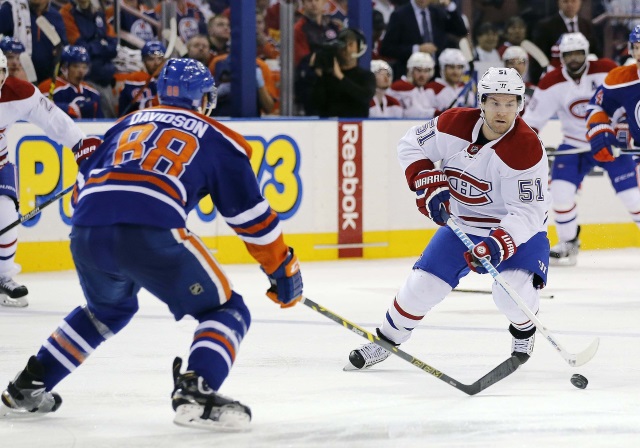 The Edmonton Oilers have traded defenseman Brandon Davidson to the Montreal Canadiens for center David Desharnais.