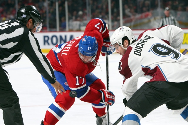 Matt Duchene of the Colorado Avalanche and Torrey Mitchell of the Montreal Canadiens