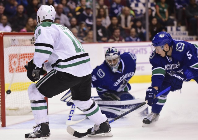 Patrick Eaves of the Dallas Stars and Ryan Miller of the Vancouver Canucks