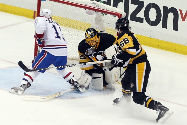 Marc-Andre Fleury of the Pittsburgh Penguins and Brendan Gallagher of the Montreal Canadiens