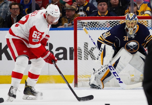Thomas Vanek of the Detroit Red Wings and Anders Nielsson of the Bufflalo Sabres