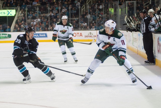 Zach Parise of the Minnesota Wild and Logan Couture of the San Jose Sharks