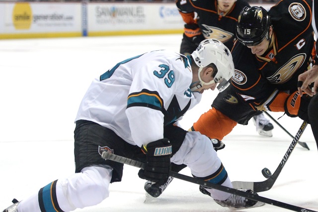 Logan Couture of the San Jose Sharks and Ryan Getzlaf of the Anaheim Ducks