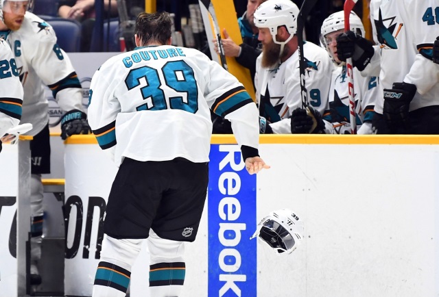 San Jose Sharks forward Logan Couture takes a puck to the mouth