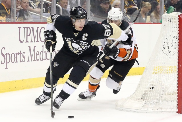 Sidney Crosby of the Pittsburgh Penguins and Andrew Cogliano of the Anaheim Ducks