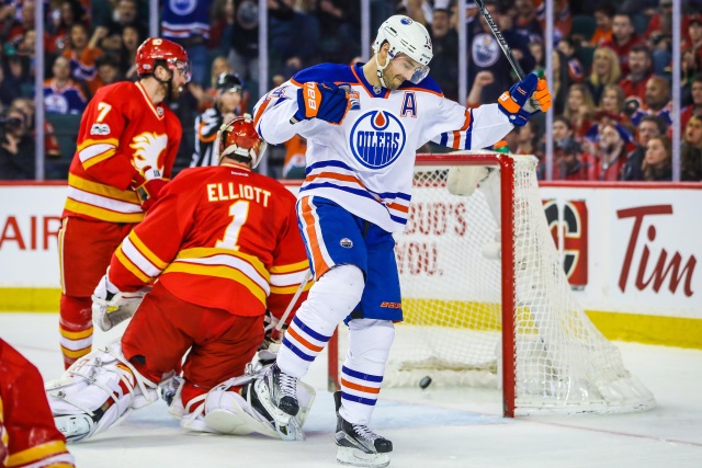 Edmonton Oilers forward Jordan Eberle scoring on Calgary Flames goalie Brian Elliott