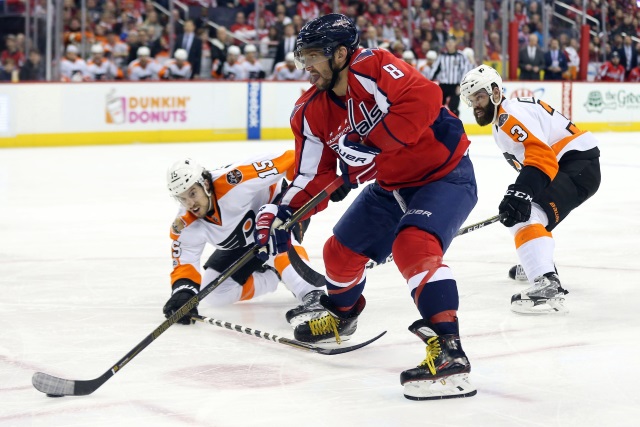 Alex Ovechkin of the Washington Capitals and Michael Del Zotto of the Philadelphia Flyers