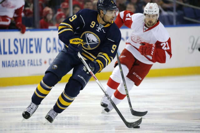 Evander Kane of the Buffalo Sabres and Tomas Tatar of the Detroit Red Wings