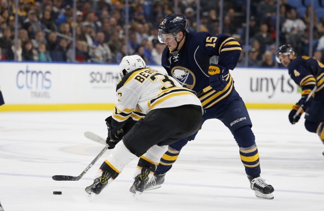 Jack Eichel of the Buffalo Sabres and Patrice Bergeron of the Boston Bruins