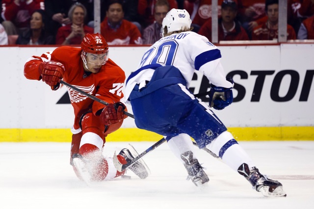 Andreas Athanasiou of the Detroit Red Wings and Vladislav Namestnikov of the Tampa Bay Lightning