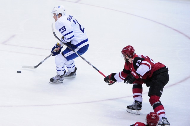 Oliver Ekman-Larsson of the Arizona Coyotes and William Nylander of the Toronto Maple Leafs