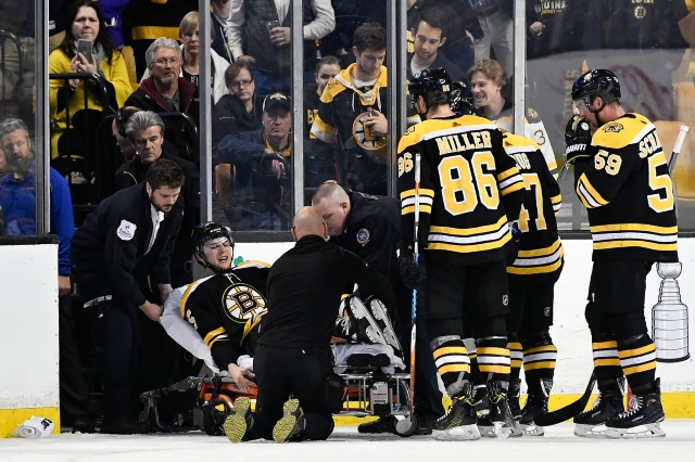 Boston Bruins defenseman Brandon Carlo stretchered off with a leg injury.