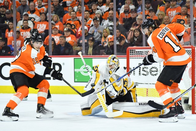 Flyers Sean Couturier leaves practice early after a collision with Radko Gudas.