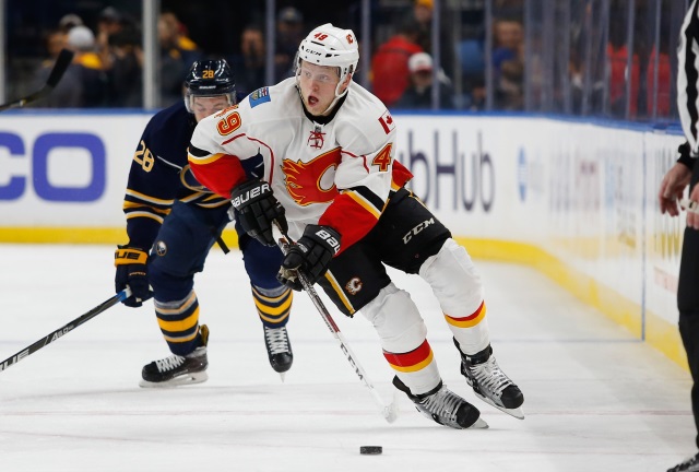 The Calgary Flames trade Hunter Shinkaruk to the Montreal Canadiens for Kerby Rychel.