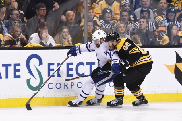 Kevan Miller hospitalized after taking a puck to the throat.