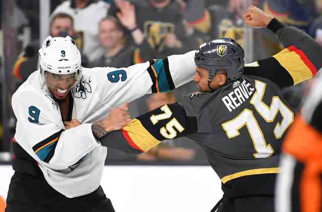 Ryan Reaves and Evander Kane drop the mitts.