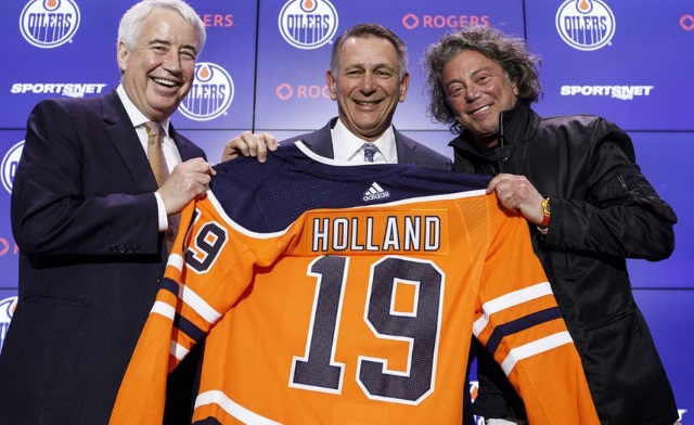 NHL-Oilers-Holland-poses-at-press-conference-1040×572