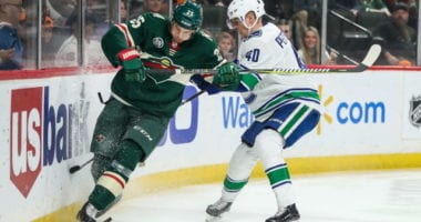 Elias Pettersson of the Vancouver Canucks and Jonas Brodin of the Minnesota Wild