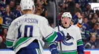 Vancouver Canucks GM on salary cap issues. Notes on Elias Pettersson, Quinn Hughes and Brock Boeser.